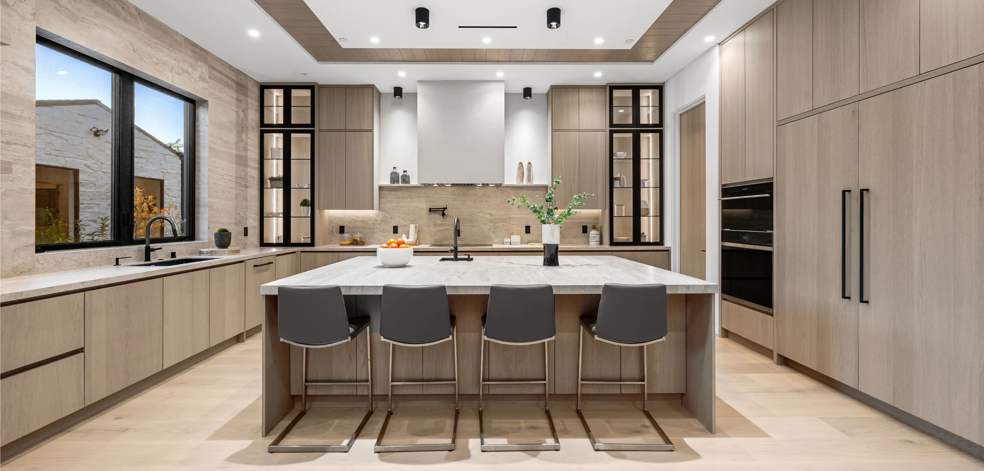 Modern kitchen with wood and charcoal cabinetry